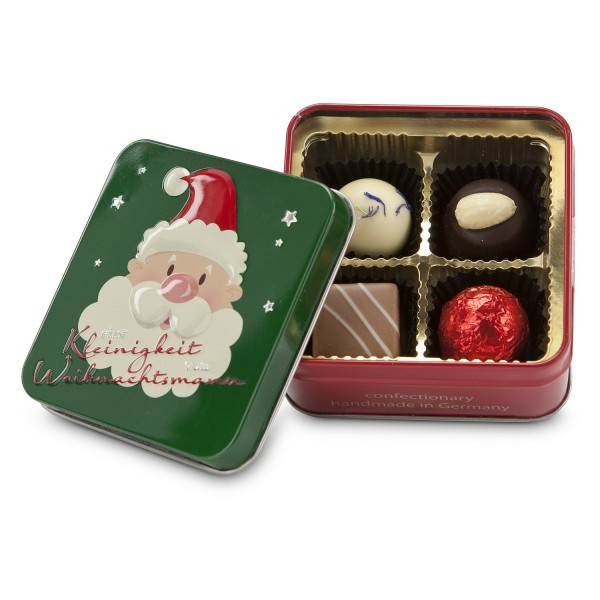 Pralinen und Trüffel in Weihnachtsdose